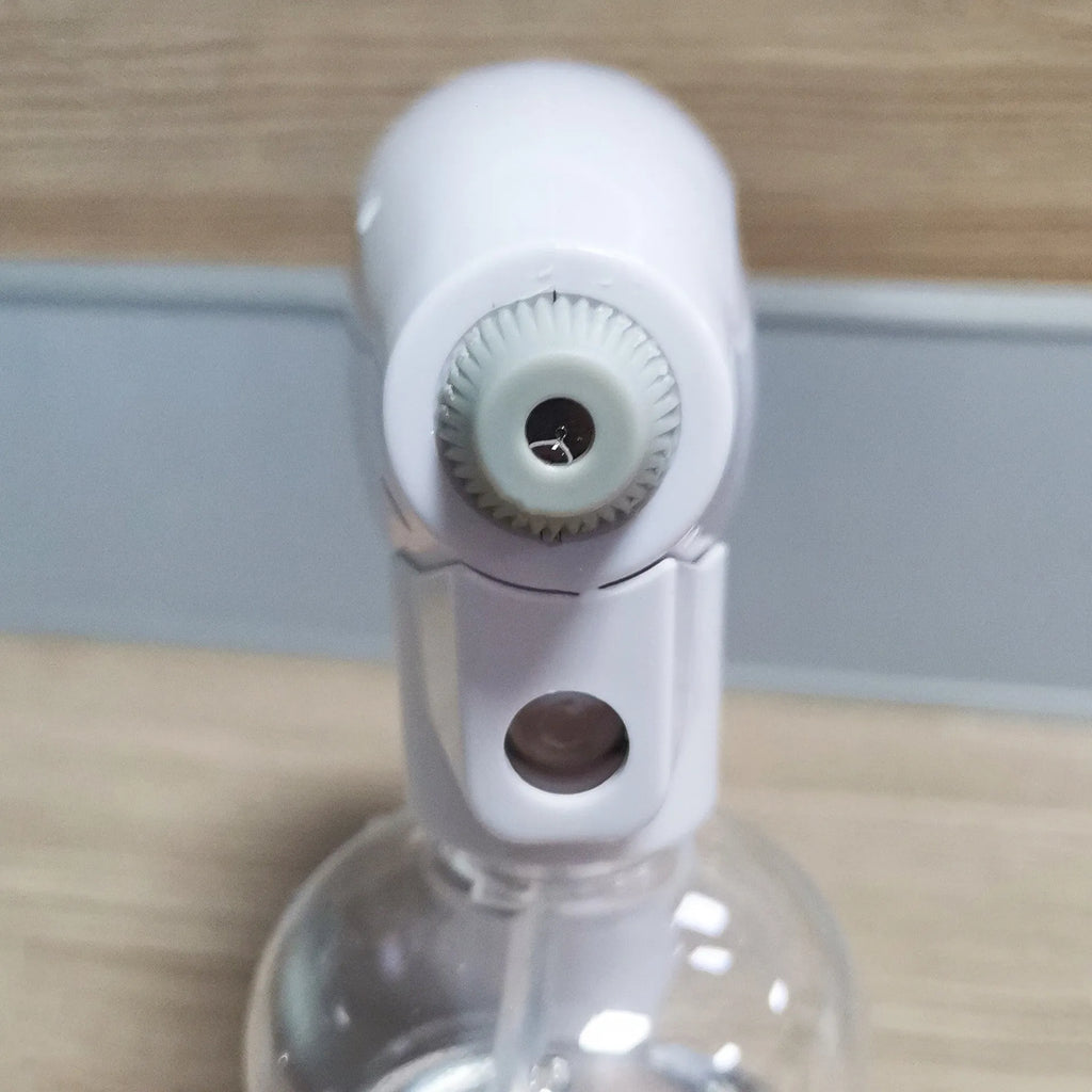 White handheld wireless electric spray disinfection gun with bottle and USB cable