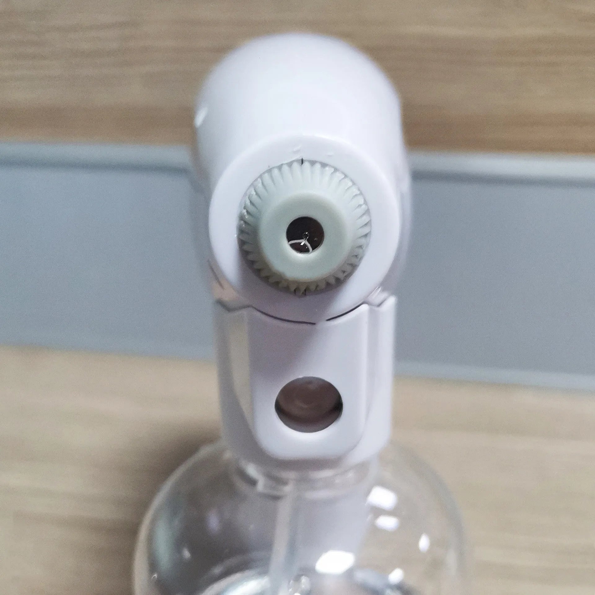 White handheld wireless electric spray disinfection gun with bottle and USB cable
