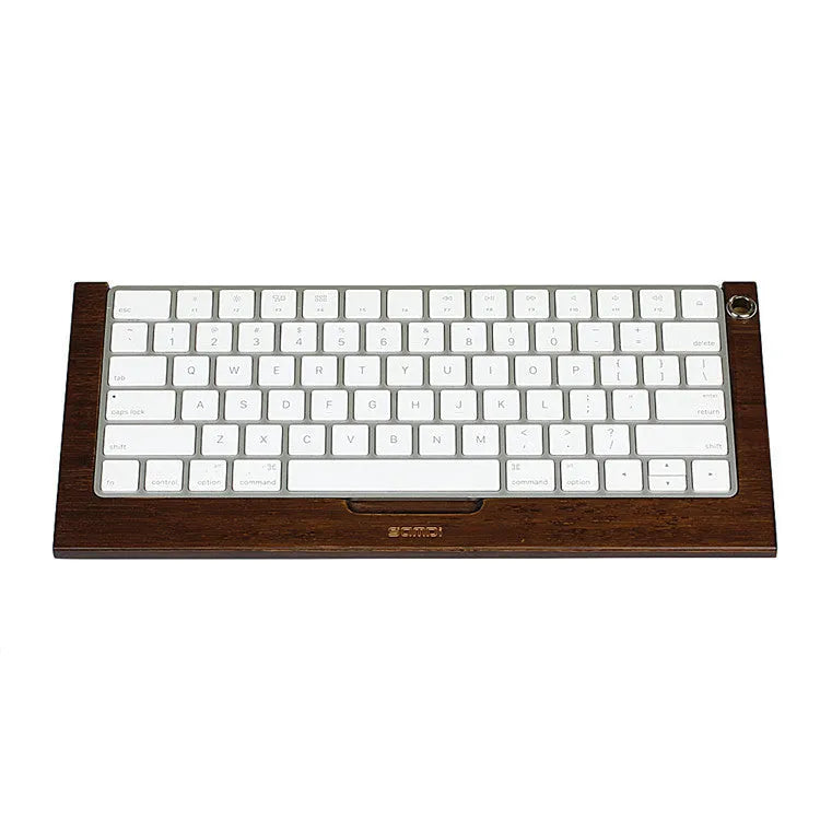 Bamboo holder for Apple Bluetooth Keyboard 2nd Generation with primary colour finish on desk