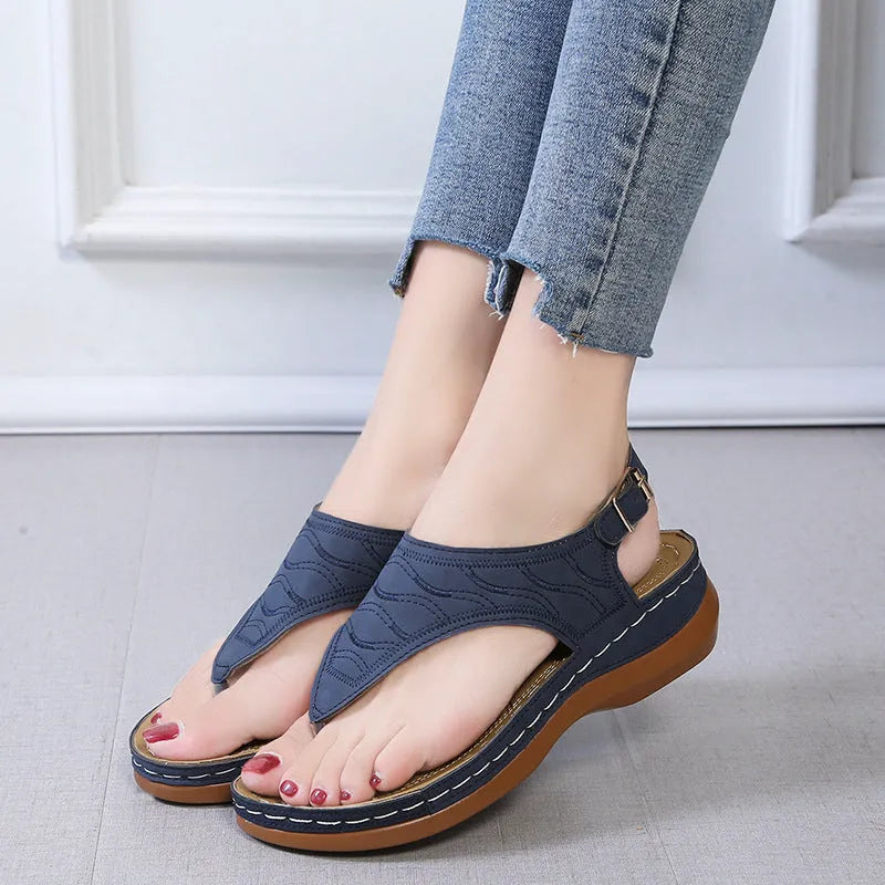 Women's wedge heel flip flop sandals with adjustable buckle strap in solid colours