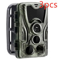 Green cellular trail camera with lens display showing 16MP resolution and 65ft night vision specifications