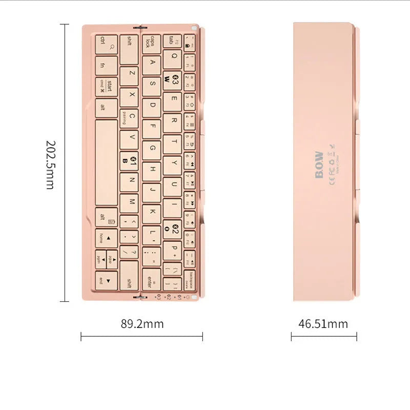 Silver white folding Bluetooth keyboard with stand holding a smartphone, showing compact folded size