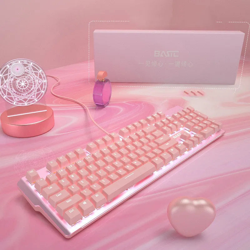 Pink mechanical keyboard and matching wired mouse set for PC gaming with backlit keys.