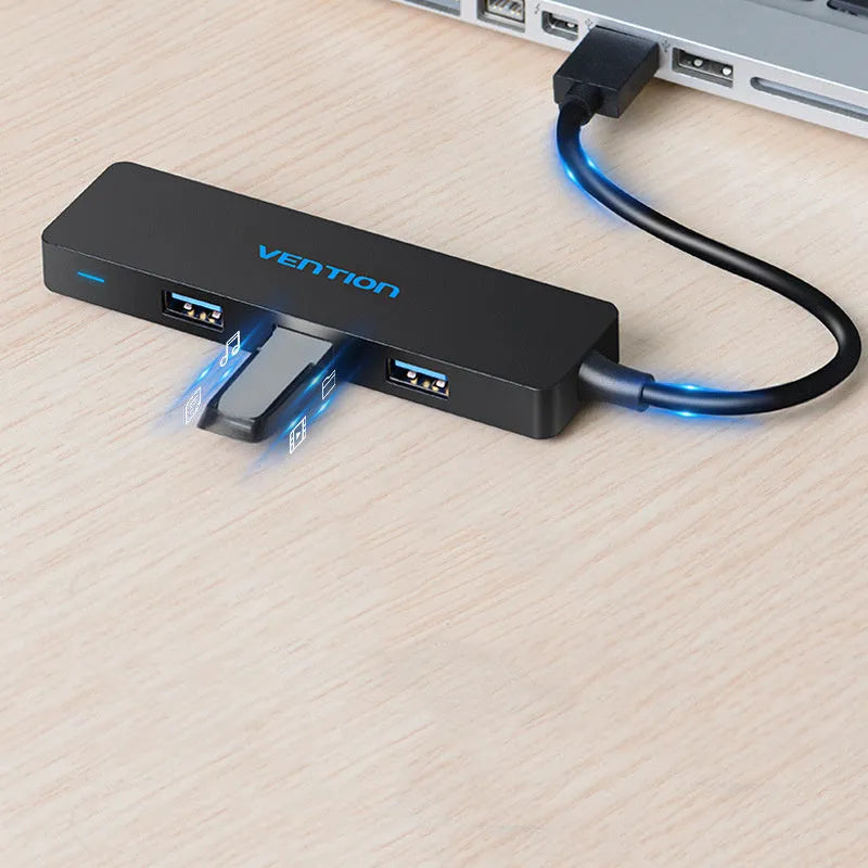 Black USB 3.0 four-port hub with nickel-plated connectors and braided 0.15 metre cable