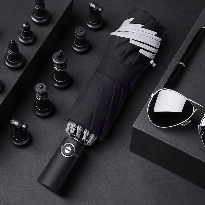 Automatic reverse umbrella showing three-fold design and plastic non-slip handle