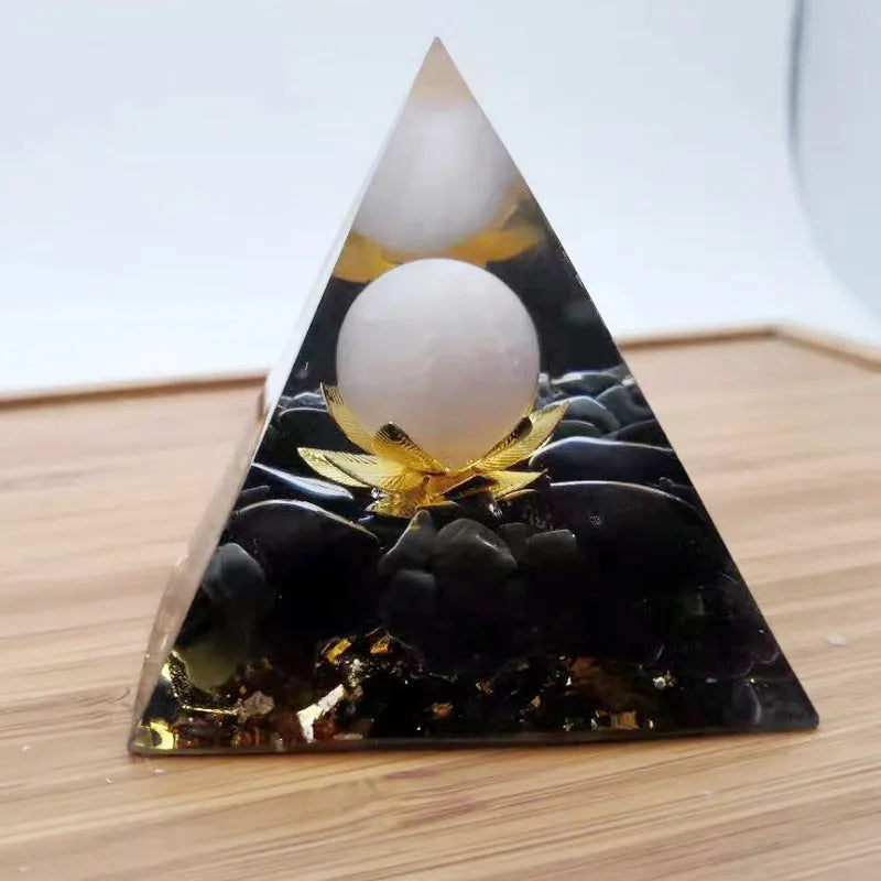 Black resin pyramid ornament 60x60mm on a white surface with white square paper box packaging