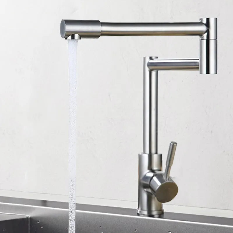 Silver stainless steel kitchen faucet with dual handles and rotating spout