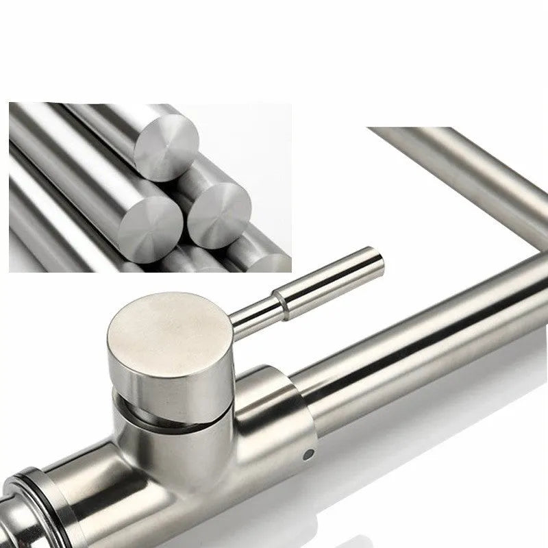 Silver stainless steel kitchen faucet with dual handles and rotating spout