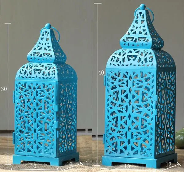 Blue geometric metal candelabra with hollow retro design and Moroccan lantern styling