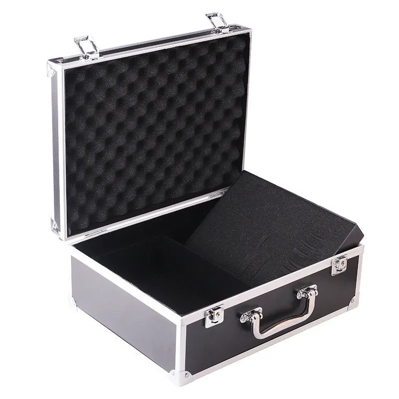 Black aluminium tattoo equipment storage box containing tattoo needles, inks, and tools