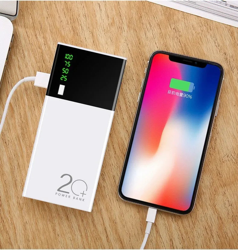 Black 20000mAh power bank measuring 135mm by 60mm with included charging cable