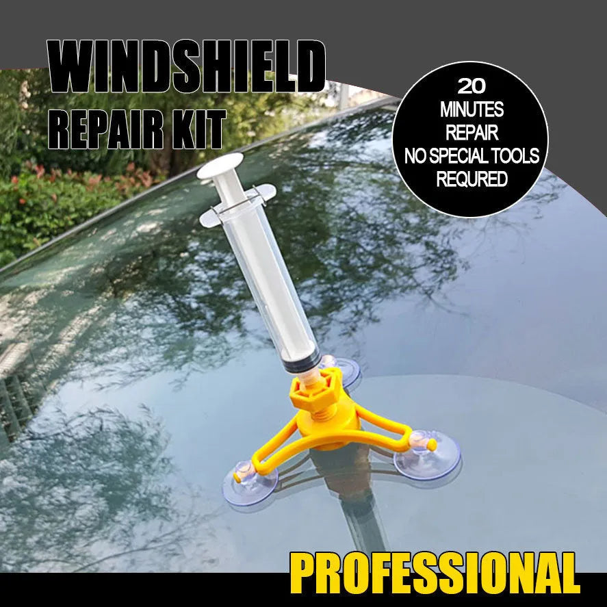 Yellow auto glass repair tool with triangle bracket and 2ML repair fluid on a car windshield