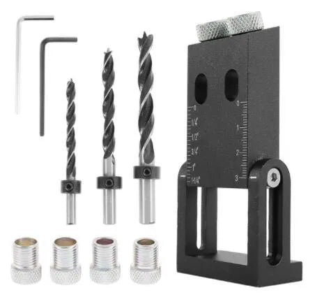 Black aluminium alloy woodworking perforation locator tool with sleeves and drill bits for dowel hole alignment.