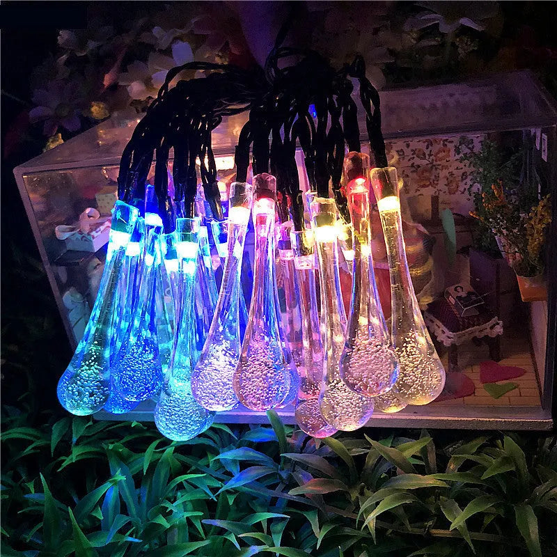 Solar-powered LED outdoor string lights with bubble drop pendants on 6.5 metre cable