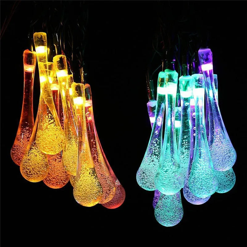 Solar-powered LED outdoor string lights with bubble drop pendants on 6.5 metre cable