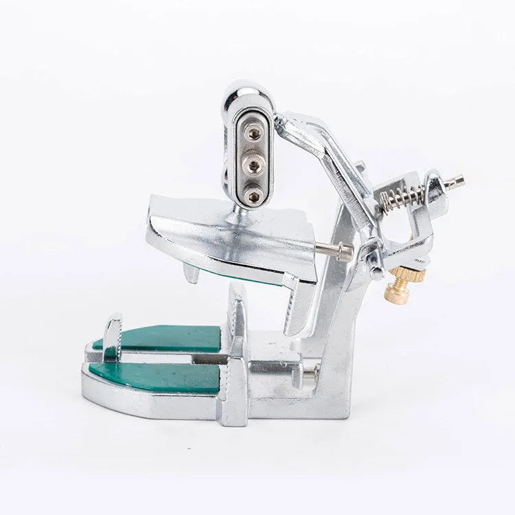 Korean dental articulator with adjustable components for crown and bridge laboratory work