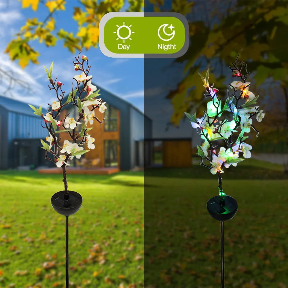 Solar-powered cherry blossom firework string light with ground stake for outdoor garden.