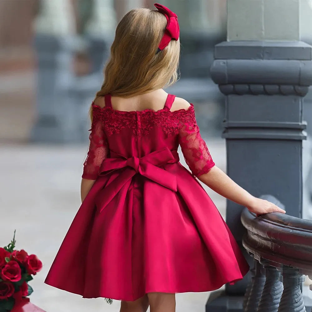 Girls' simple lace dress in polyester available in red, pink, white, green and dark red.