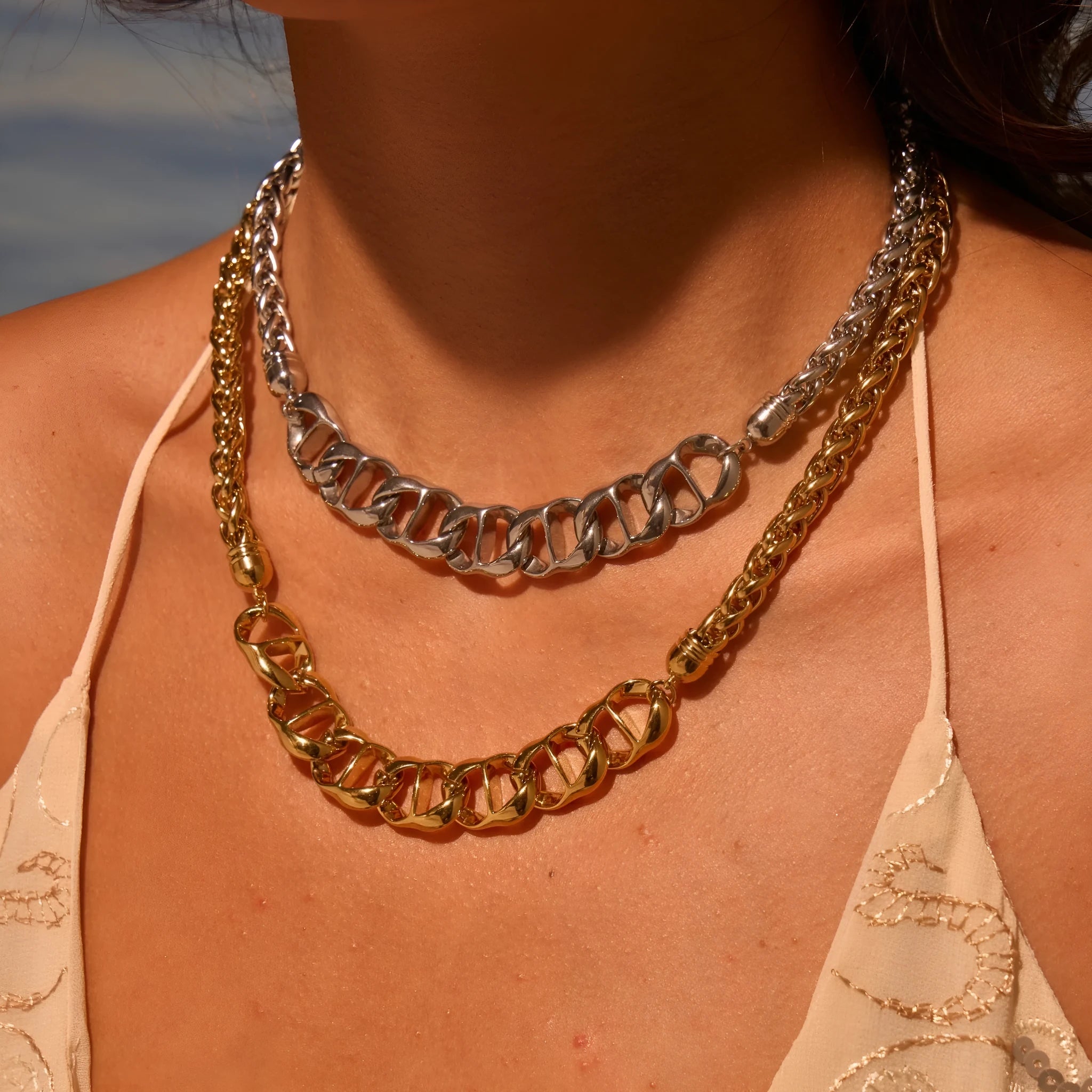 Stainless steel women's necklace with geometric pendant and regular chain in gold or steel finish