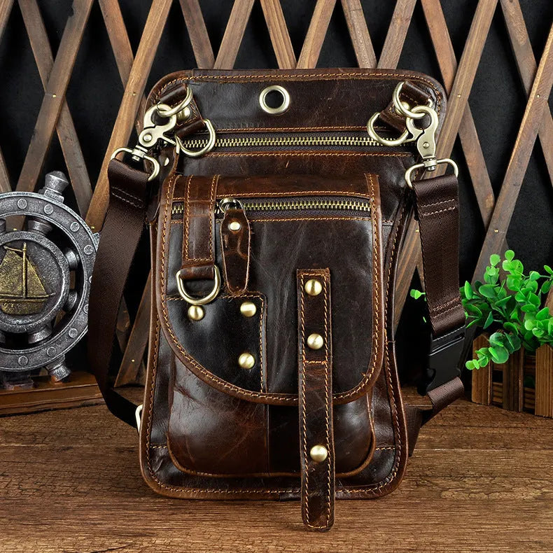 Genuine leather men's punk fanny pack showing horizontal design and internal organisation compartments