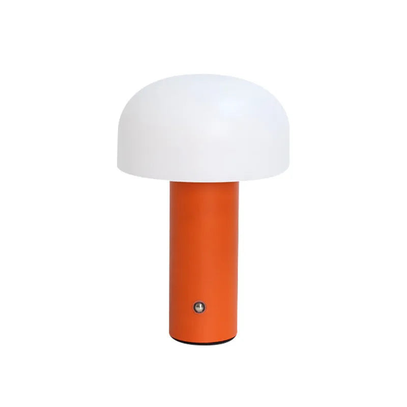 Plastic USB table lamp in black, green, orange, or white on a desk surface.
