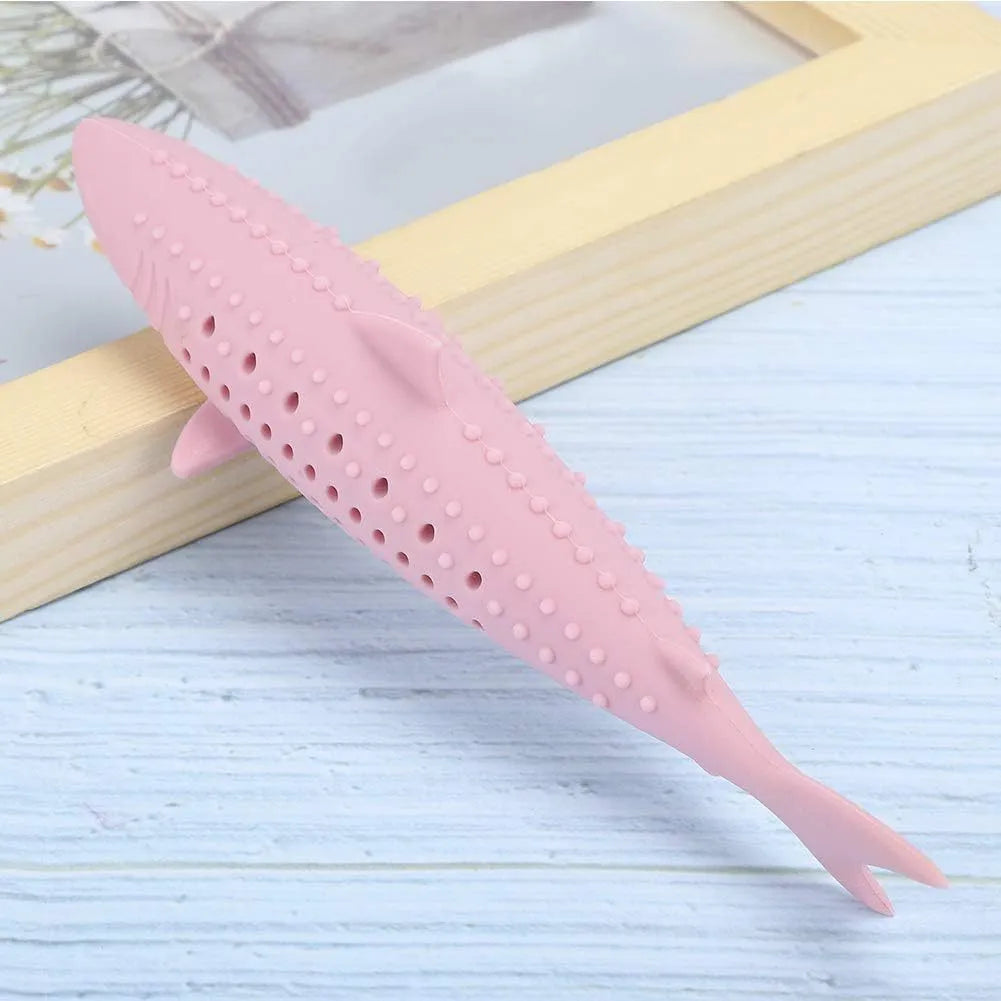 Green silicone fish-shaped cat chew toy with removable design showing breathable side holes