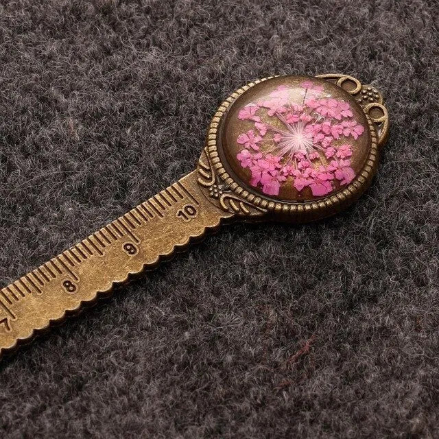 Handmade dried gypsophila flower bookmark ruler showing lace flowers, daffodils, and clovers on 12cm length