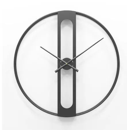Round metal wall clock with 50cm diameter in black or gold colour on a white wall.