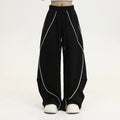 Black pleated wide-leg hip hop trousers with striped pattern and loose fit