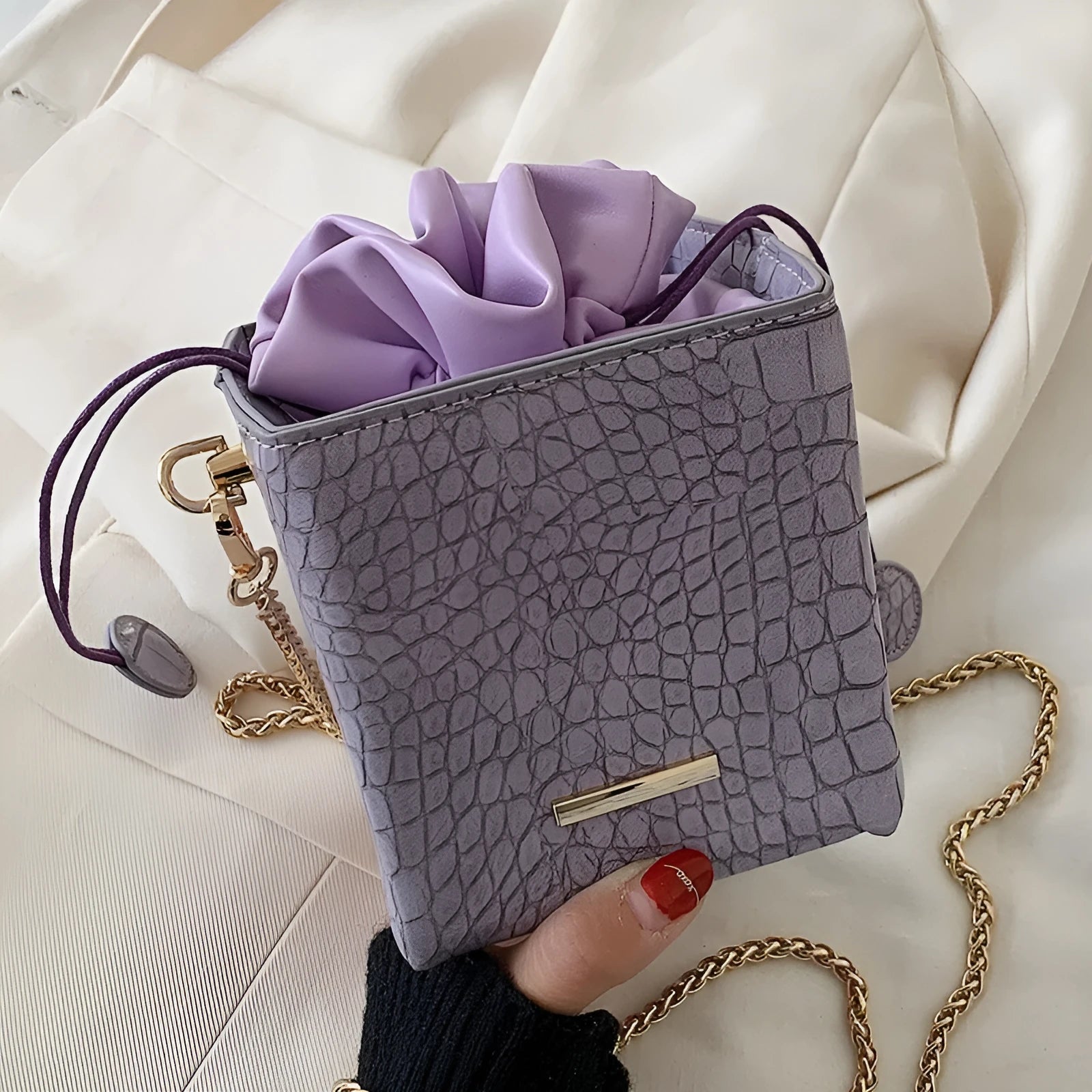 Small women's messenger bag with chain detailing in six colour options