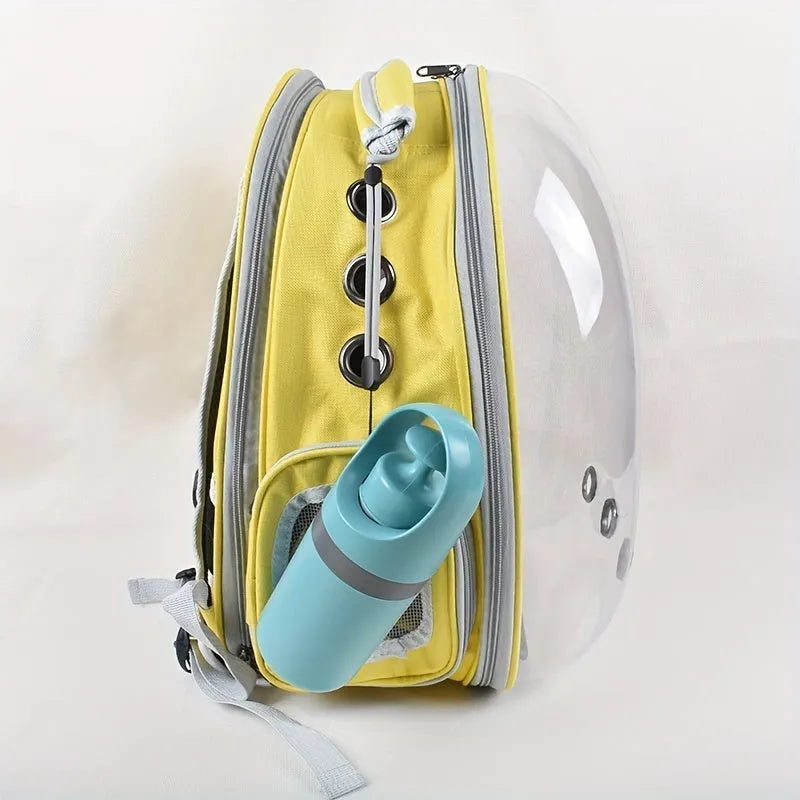 Blue portable dog poop scooper with built-in bag dispenser, clipped to a dog leash