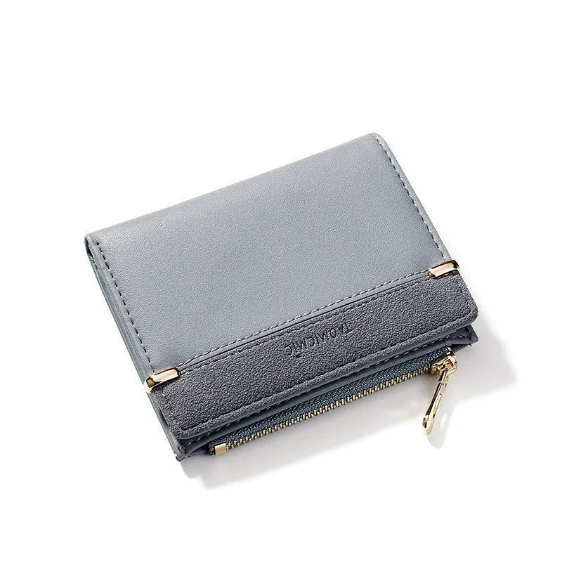 Ladies wallet with zipper closure showing multiple card slots and compartments in PU leather