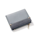 Ladies wallet with zipper closure showing multiple card slots and compartments in PU leather