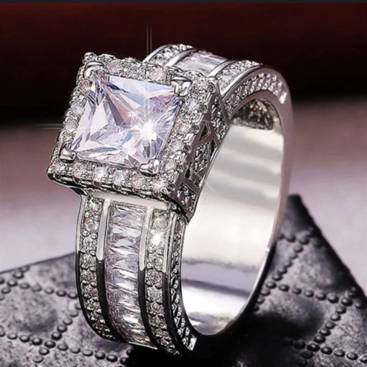 Silver alloy geometric women's engagement ring with round elements in gold or white electroplated finish