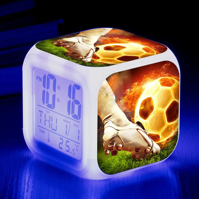 Square plastic alarm clock with football pattern cartoon design and mute alarm function
