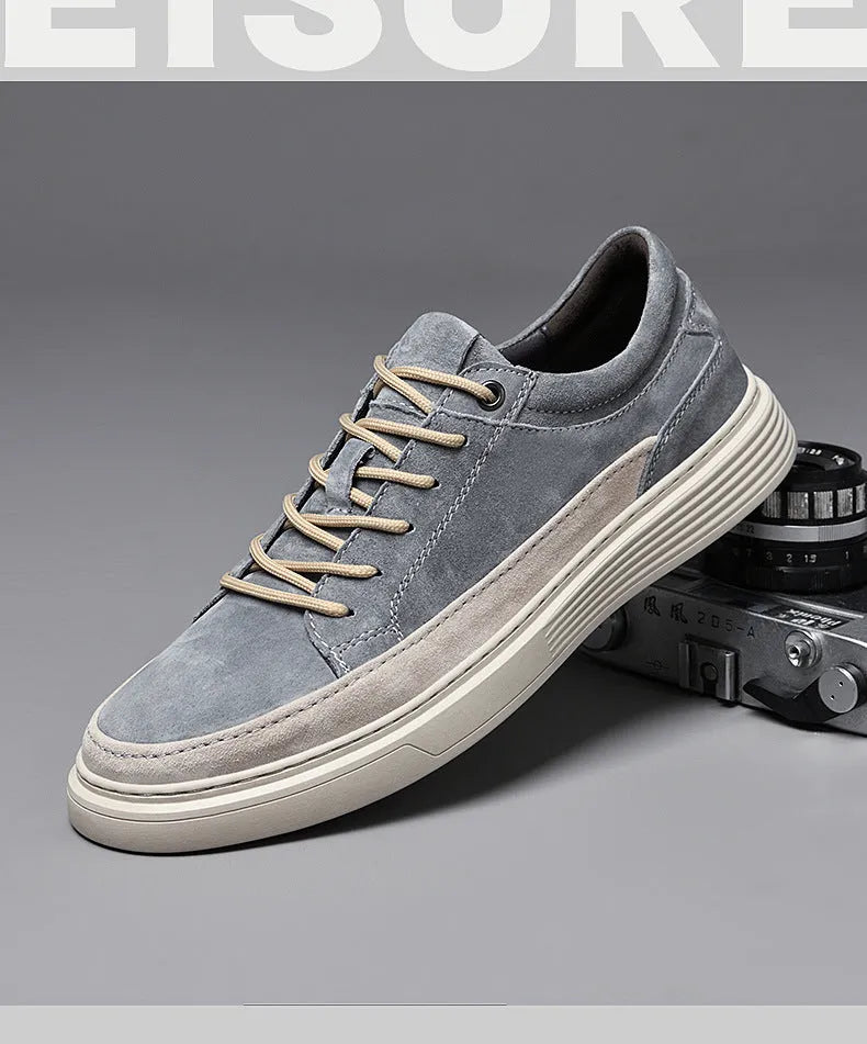 Men's grey casual skate shoes with pigskin upper and rubber sole, front lace-up design with round toe