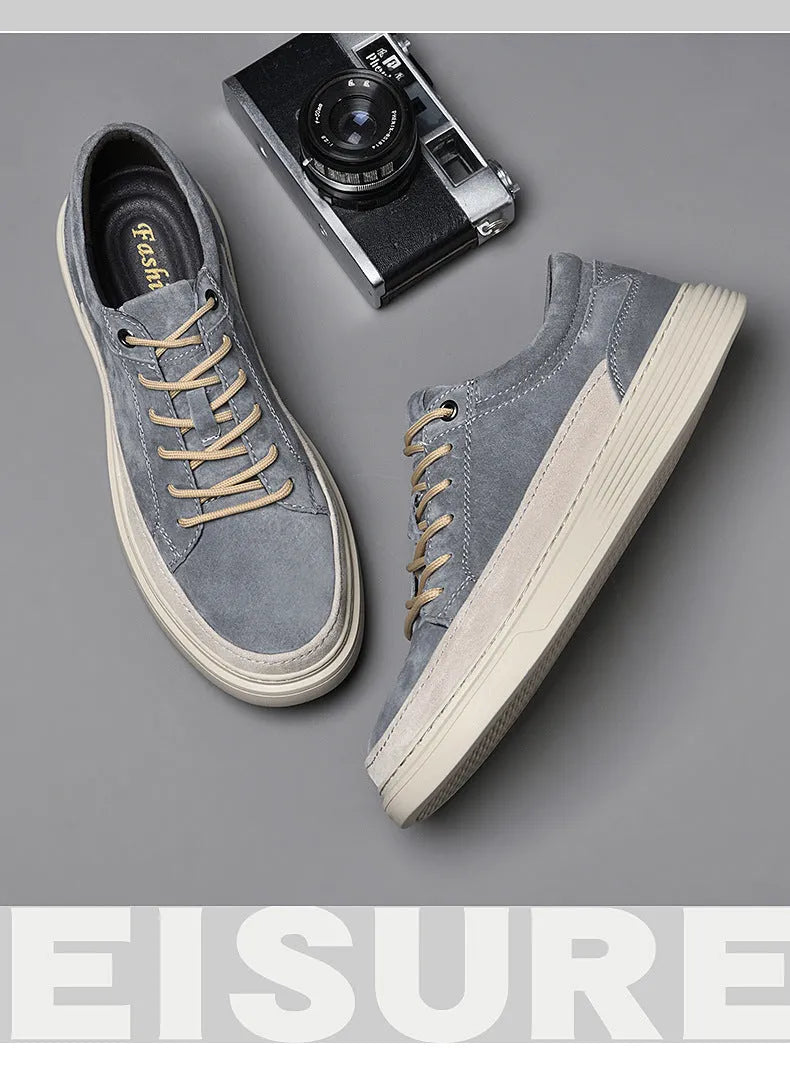Men's grey casual skate shoes with pigskin upper and rubber sole, front lace-up design with round toe