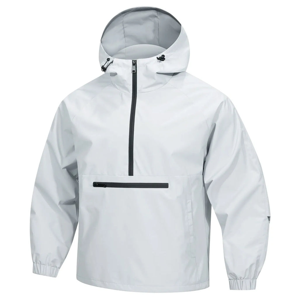 Man wearing a light gray loose fit corduroy hooded jacket with a half-zip and rabbit fur lining.