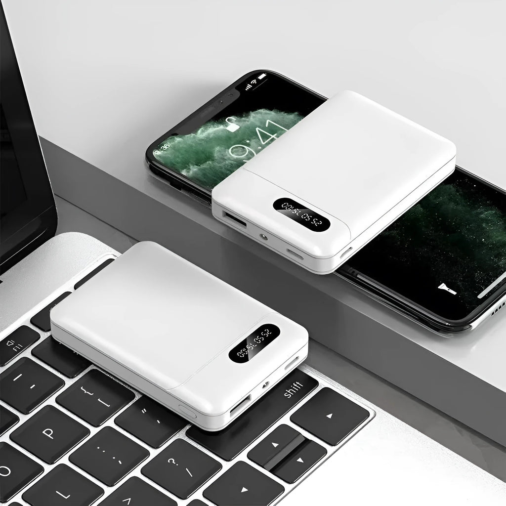 Large capacity portable power bank in black or white with multiple USB charging ports