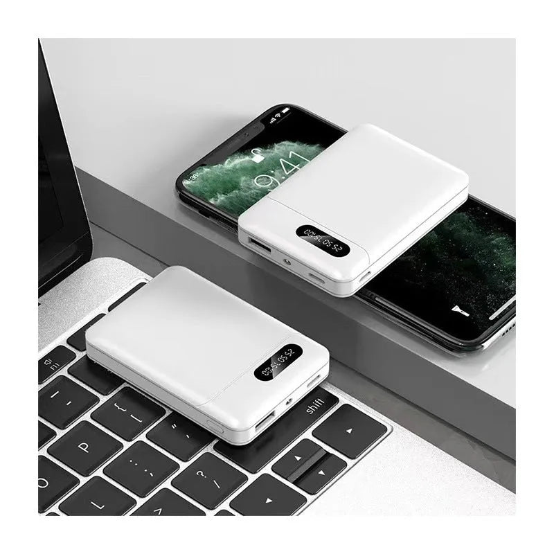 Large capacity portable power bank in black or white with multiple USB charging ports