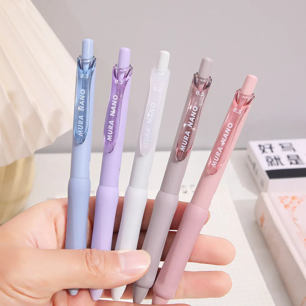 Macaron Colour Press Gel Pen with 0.5mm tip in smoked white, brown, or pink options.