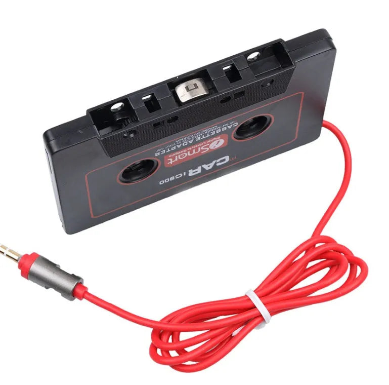 Black MP3 car cassette adapter with 3.5mm jack plug for connecting phones and music players.