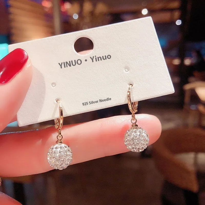Women's copper geometric earrings with electroplated zircon finish in multiple colour variations