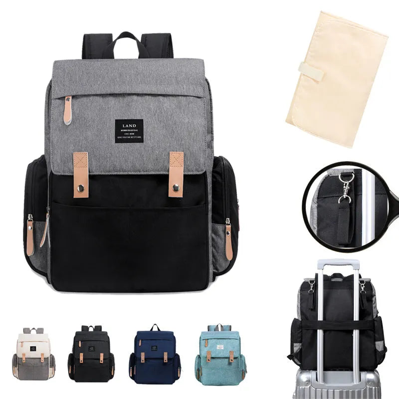 Land Mommy large grey oxford cloth diaper backpack with a changing mat