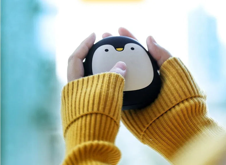 USB rechargeable electric hand warmers with cartoon penguin and polar bear designs