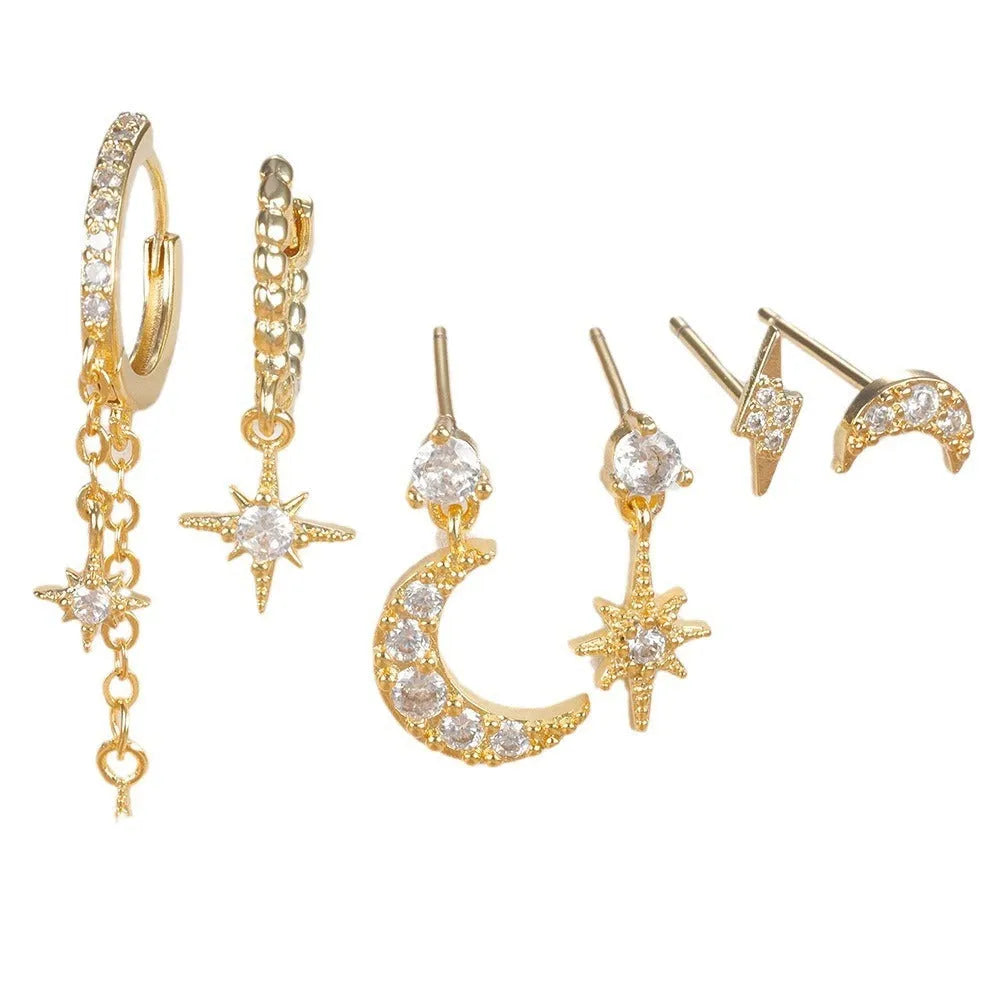 Six pairs of gold electroplated earrings including chain tassel designs and zircon studs for women