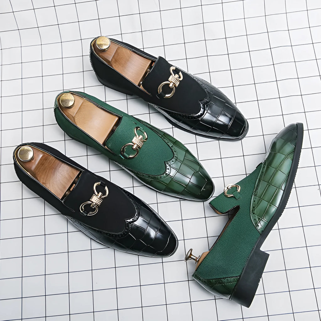 Men's black pointed-toe casual shoes with low-top design and sewn detailing on a rubber sole.