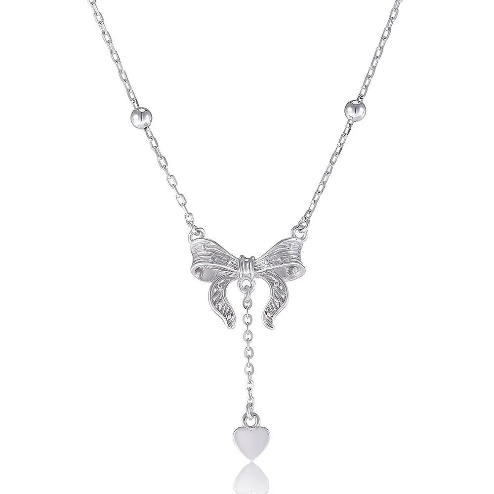 S925 sterling silver adjustable clavicle chain with a heart and butterfly pendant.