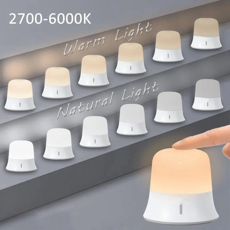 White bedside night light with touch controls for dimming and colour changing