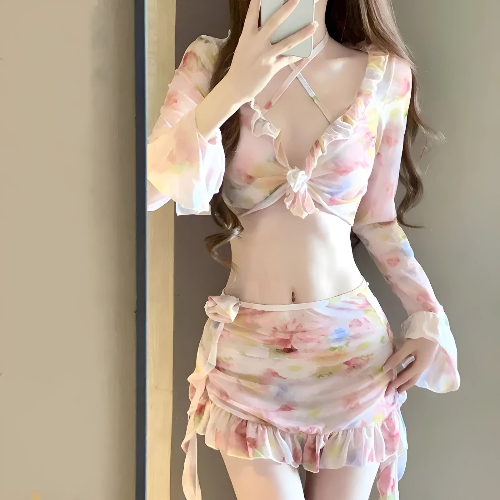 Women's floral bikini swimsuit in cherry blossom pink with matching floral print on both pieces